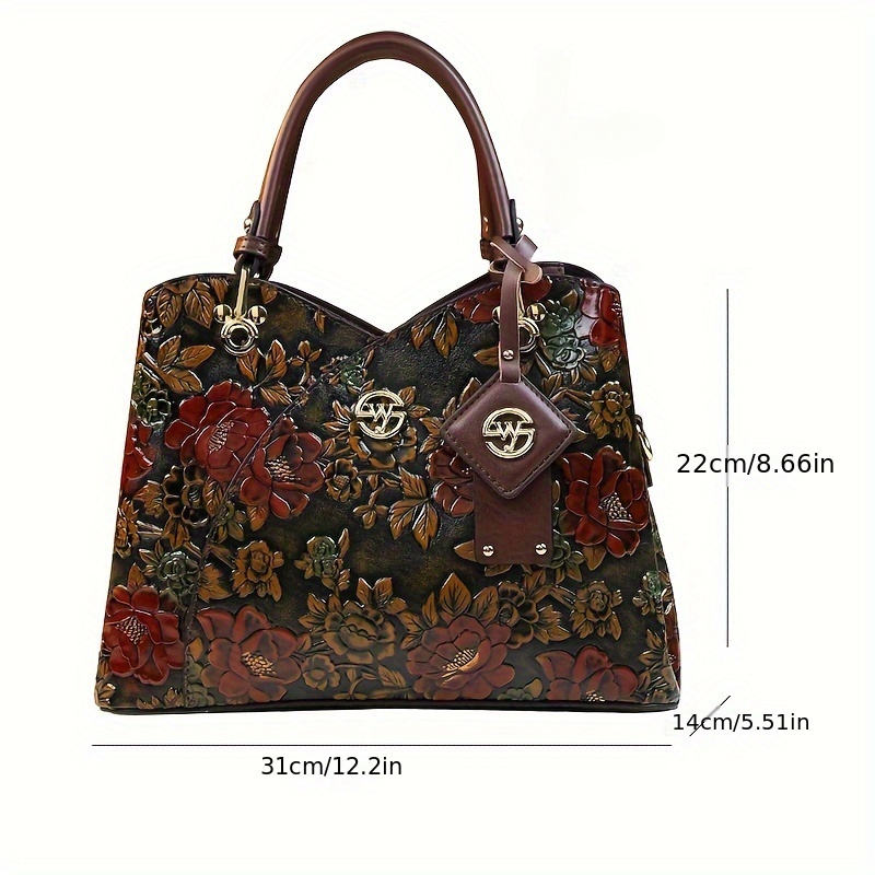 Handbag dimensions 31 cm wide, 22 cm high, 14 cm deep