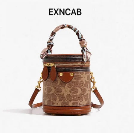 Monogram Cylinder Bag, Scarf-Handle Vanity Bag - product photo 2