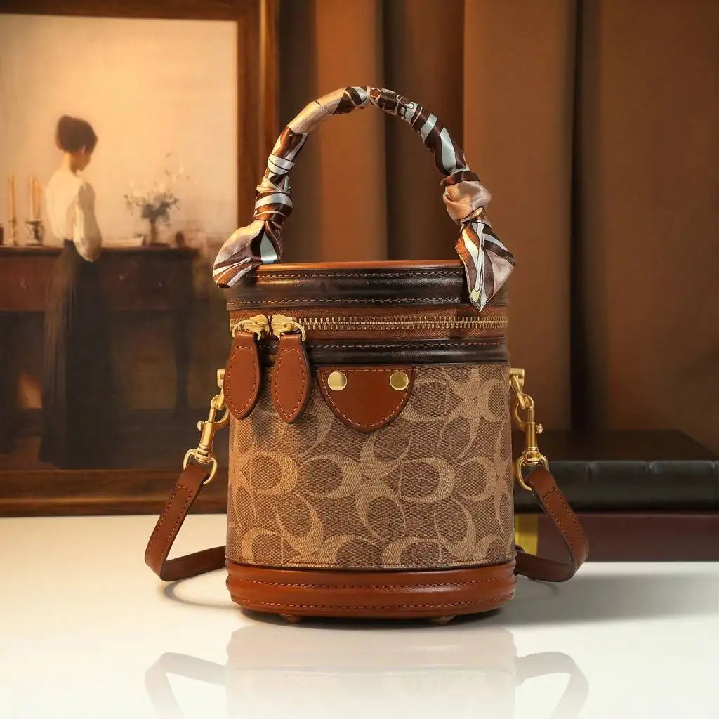 Monogram Cylinder Bag, Scarf-Handle Vanity Bag - product photo 1