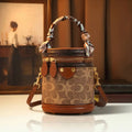 Monogram Cylinder Bag, Scarf-Handle Vanity Bag - product photo 1